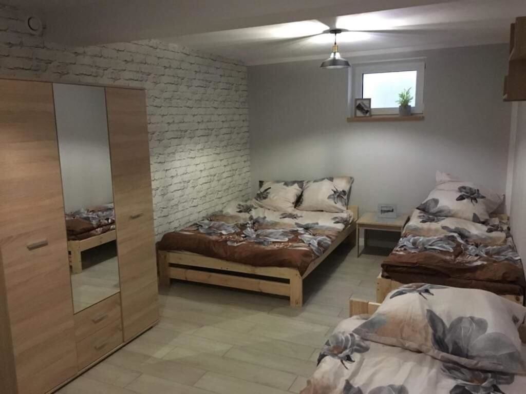 Проживание в семье Sajenek_pl Loft Basment Room Августов